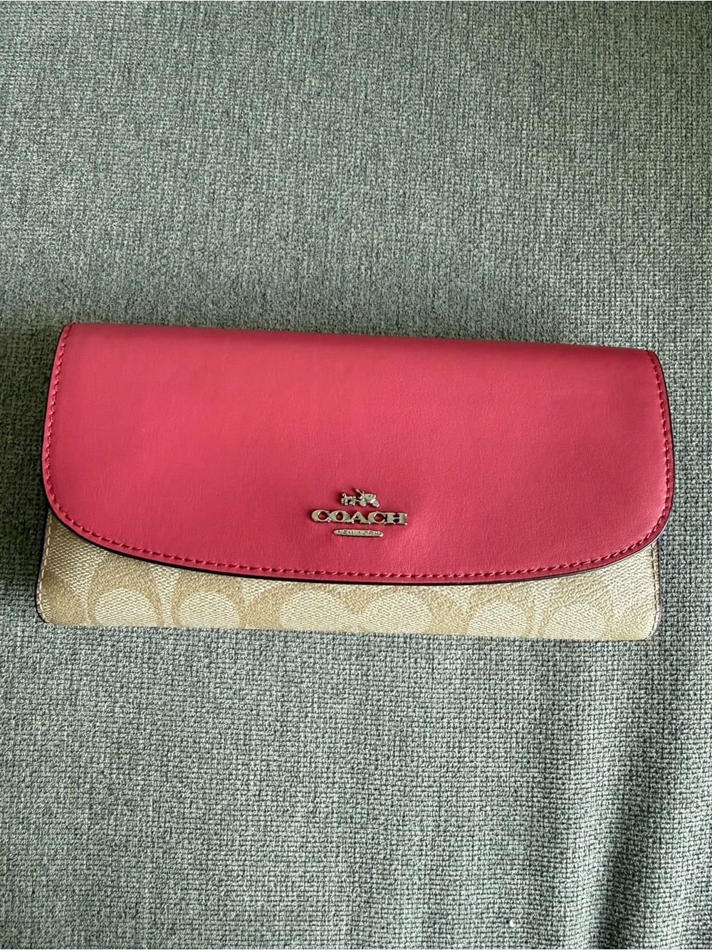 Never used!  Coach Pink Leather Flap Signature Canvas Wallet